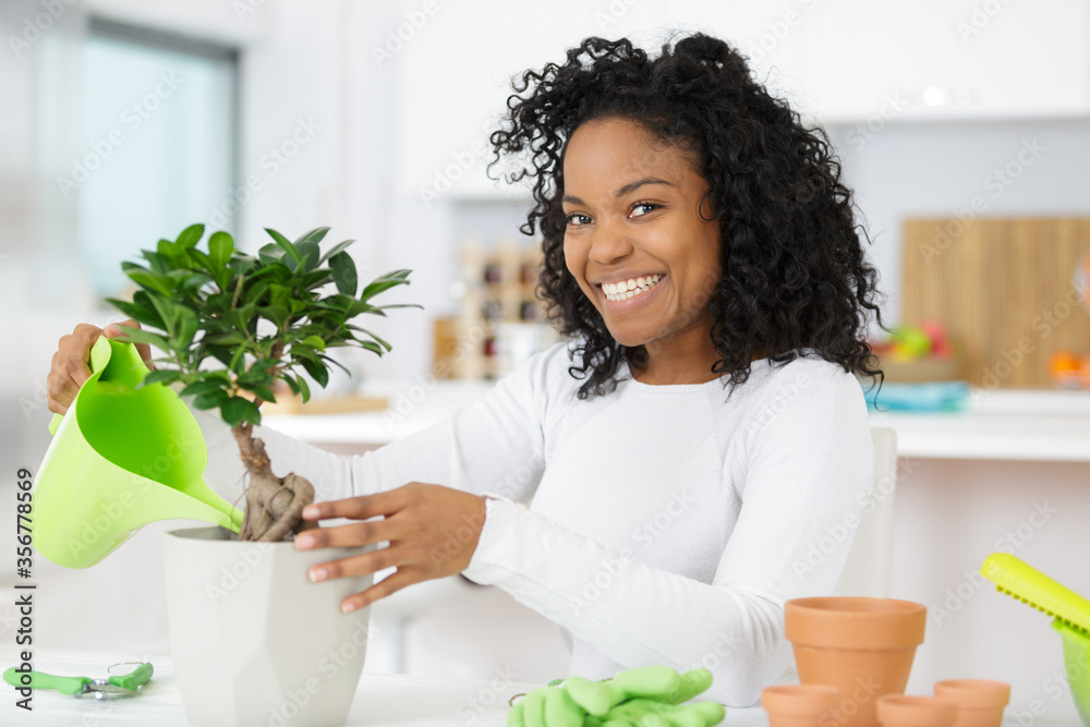 happy female gardener working from home