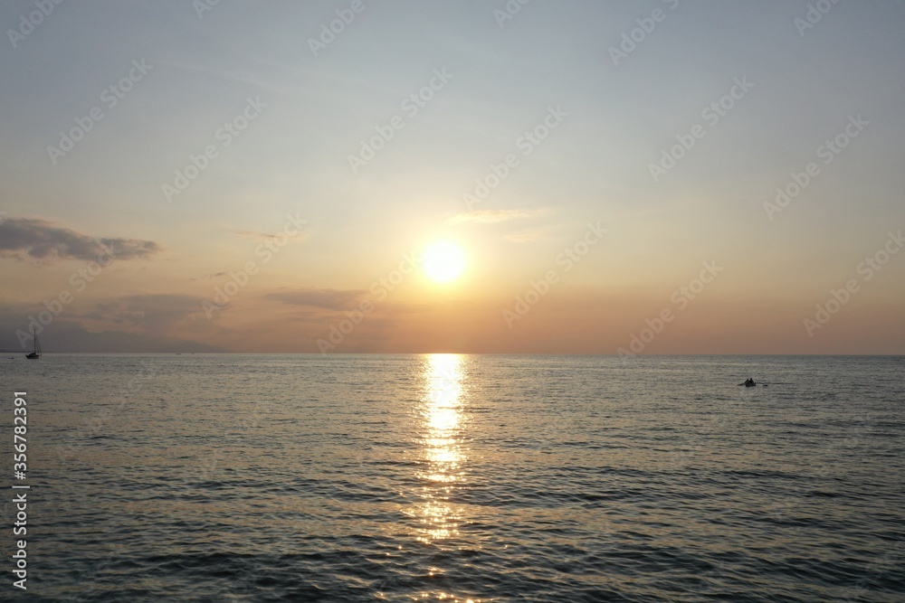 Fototapeta premium Bali Indonesia beach view of sunset from Lovina Beach