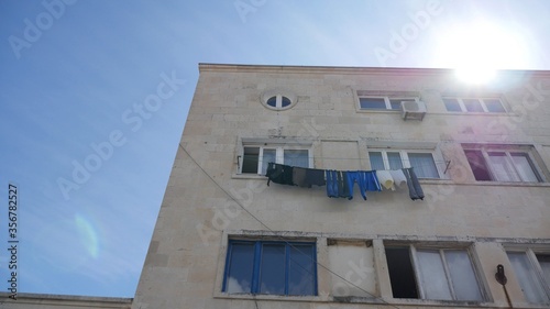 facade of a building with clothes line