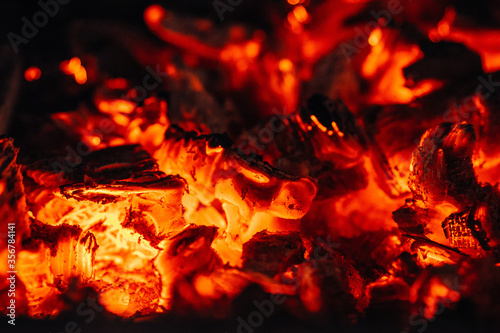 red-hot coals in the fireplace