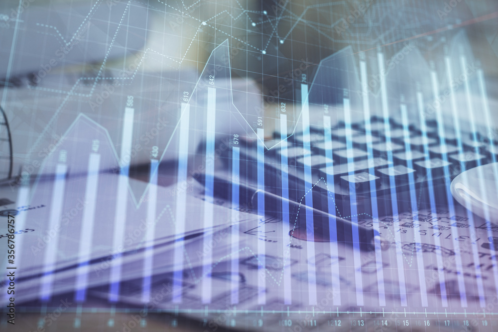 Double exposure of financial chart drawings and desk with open notebook background. Concept of forex market Double exposure of financial chart drawings and desk with open notebook background. Concept of forex market