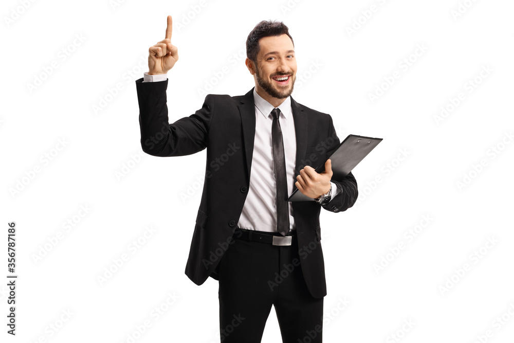 Businessman holding a clipboard with a document and pointing up Businessman holding a clipboard with a document and pointing up
