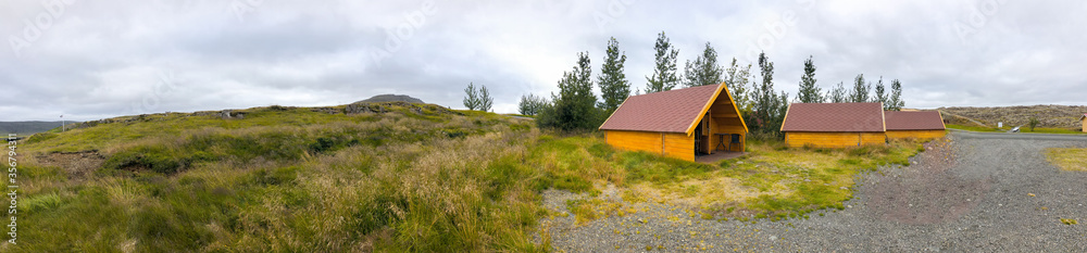 Amazing wooden homes of Iceland in summer season. Natural landscape environment