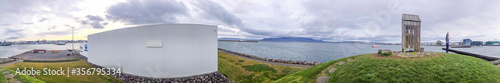 REYKJAVIK, ICELAND - AUGUST 11, 2019: Beautiful coastline of Reykjavik in summer from Thufa Hill, Iceland. Panoramic view photo