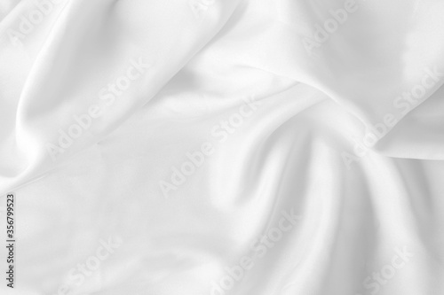 white  fabric texture background crumpled fabric background with soft waves