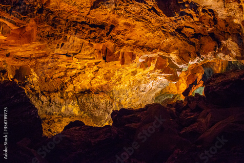  Cueva de los Verdes, Green Cave in Lanzarote. Canary Islands.  an amazing lava tube and tourist attraction on Lanzarote island, Spain. Multi-colored illumination of caves. Beautiful cave.  © Martina