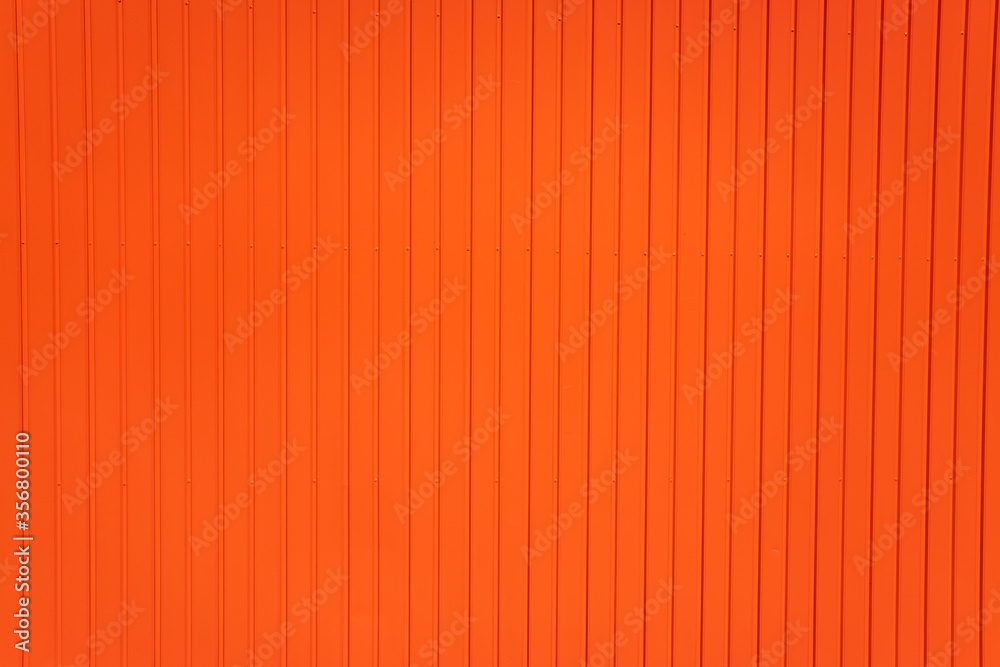 Red metallic background of parallel vertical lines Red metallic background of parallel vertical lines
