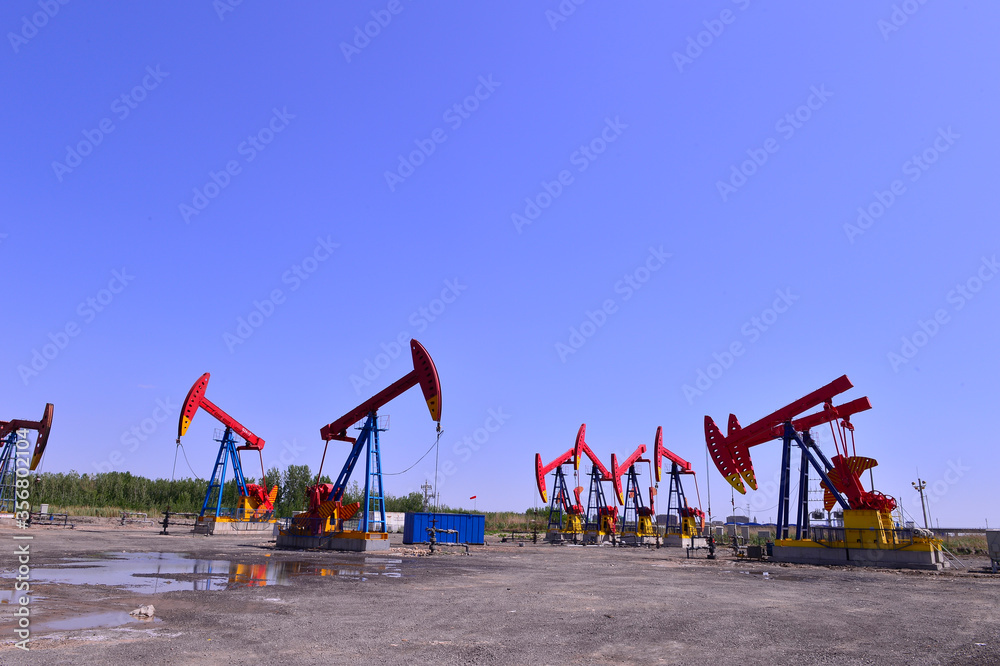 Fototapeta premium Oil pump working in the outdoor scene
