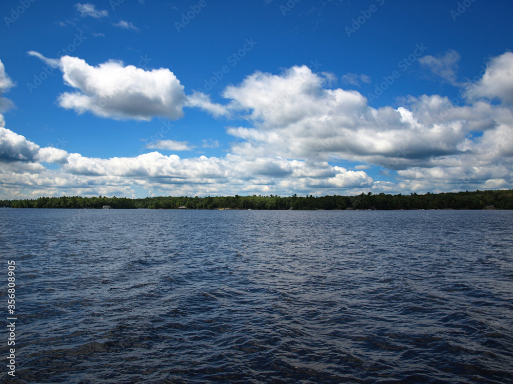 Huge lake with only water, sky and clouds - Muskoka, ON, Canada
