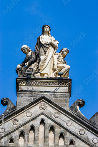 the god statue of train station "Chhatrapati Shivaji Maharaj Terminus" Mumbai India, was completed in 1887, a historic terminal train station and UNESCO World Heritage Site. 