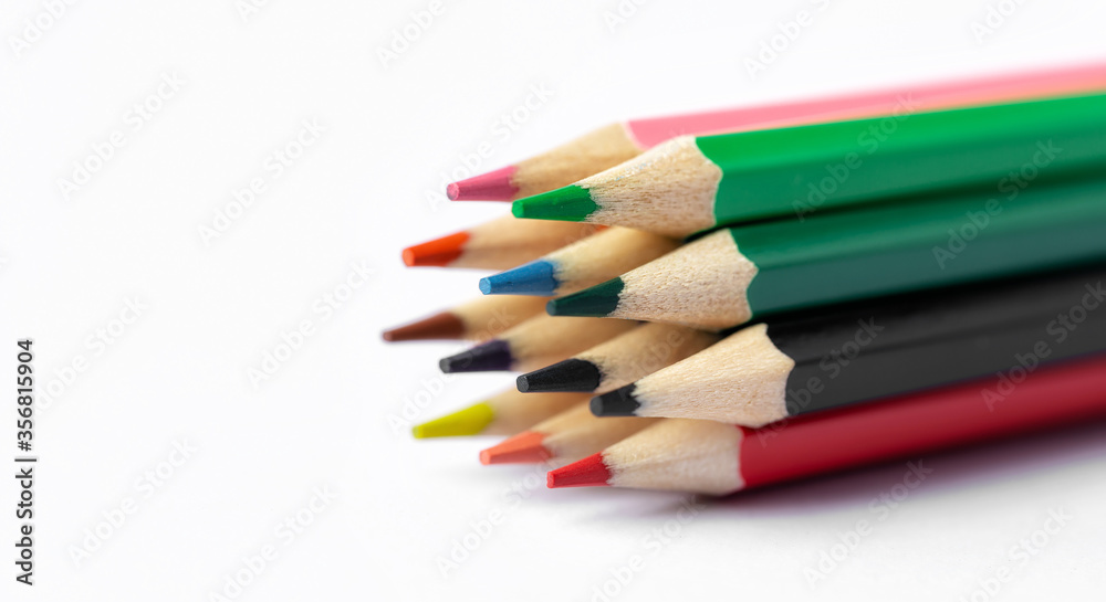 Color pencils on white background.Close up. Color pencils on white background.Close up.