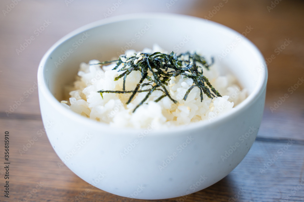 cooked japanese rice with seaweed and sesame cooked japanese rice with seaweed and sesame