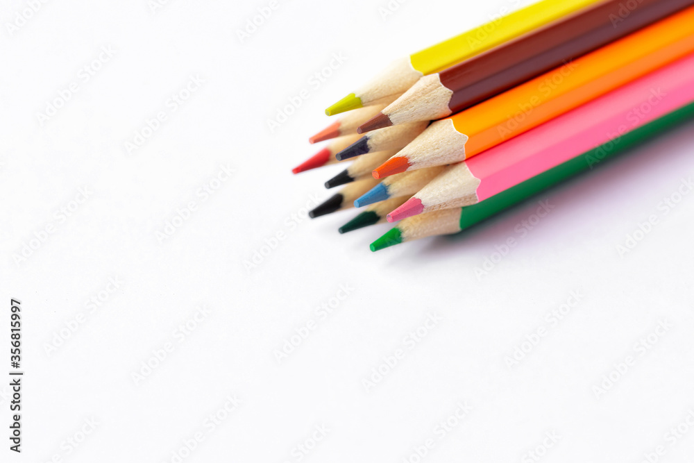 Color pencils on white background.Close up. Color pencils on white background.Close up.