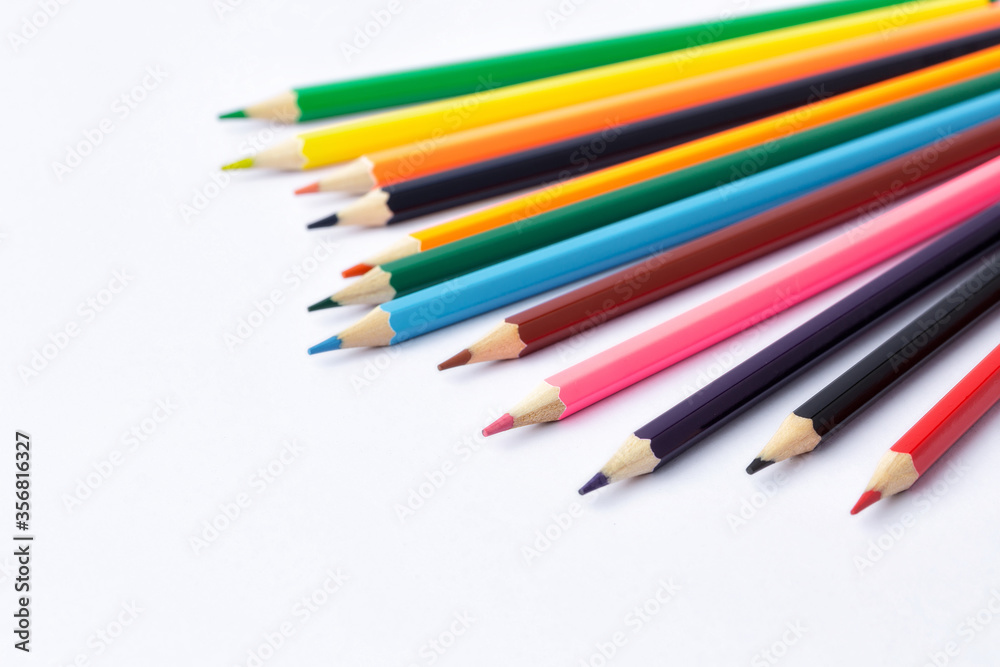 Color pencils on white background.Close up. Color pencils on white background.Close up.