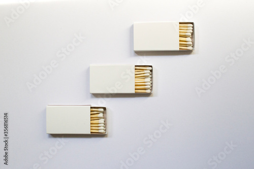 Little white matchboxes with matches rectangle