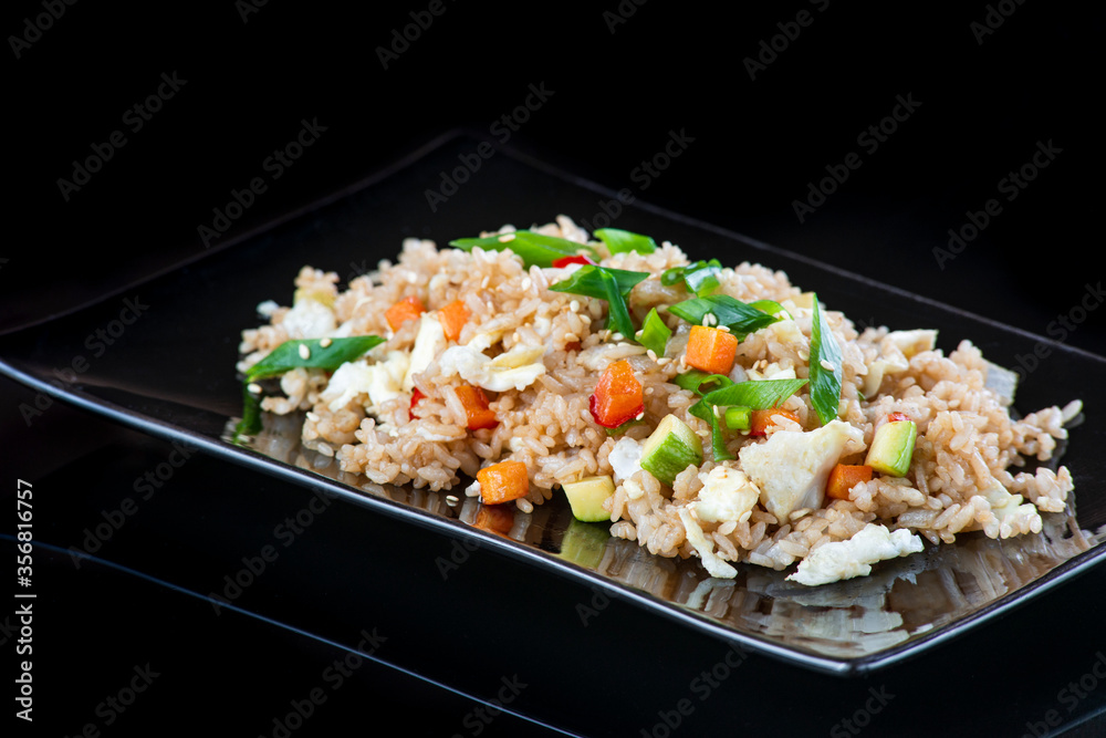 A plate of food with rice and vegetables A plate of food with rice and vegetables