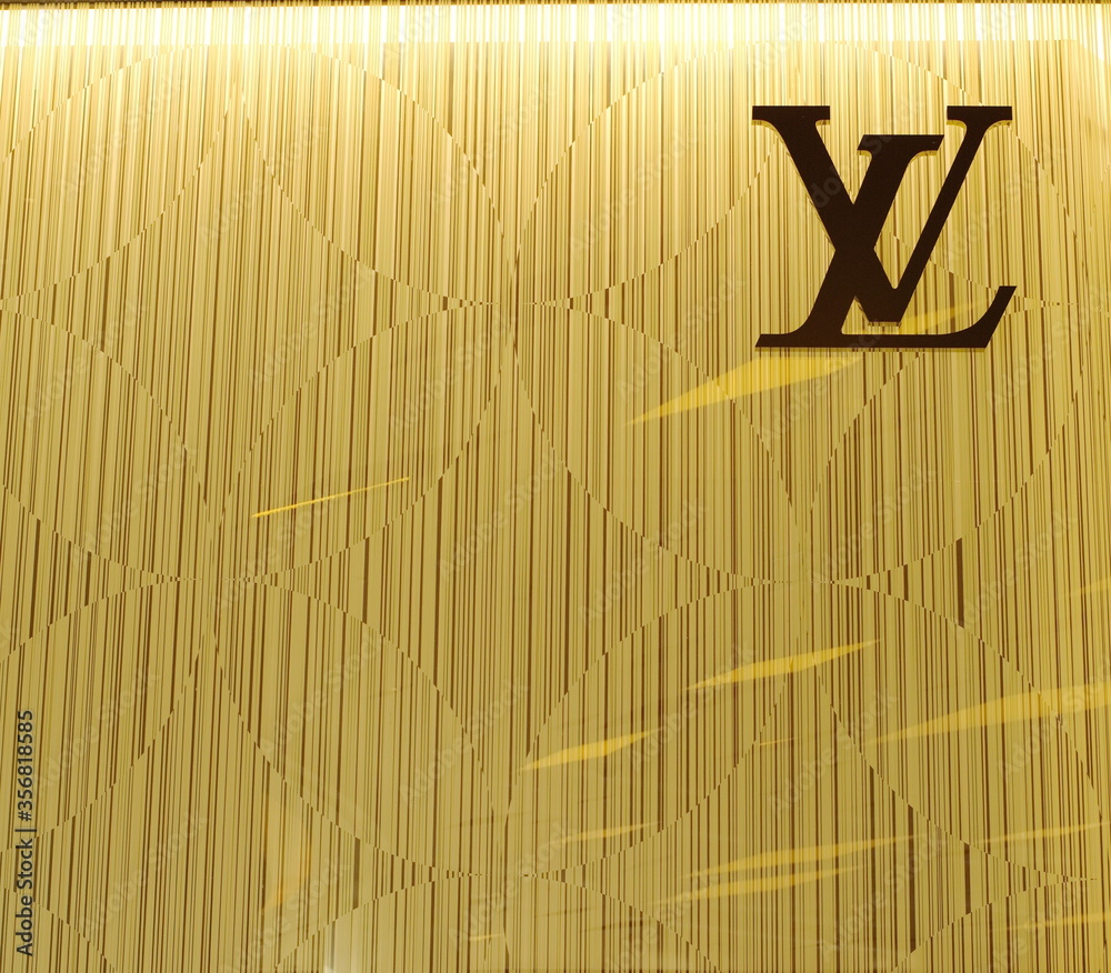 BANGKOK - JUNE 28, 2015: Louis Vuitton symbol on monogram wall at