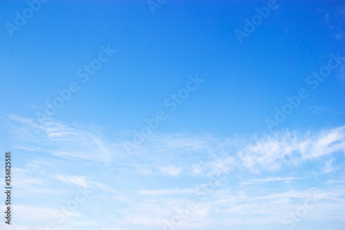 Fantastic soft white clouds against blue sky and copy space.