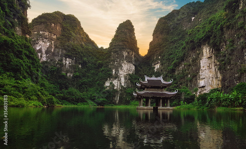 Reflection in the lake in mountains at Trang An Ninh Binh Vietnam, Boat view