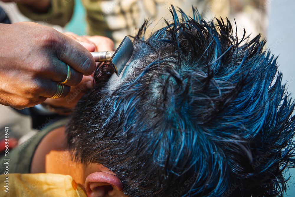Naklejka premium Man Getting Haircut