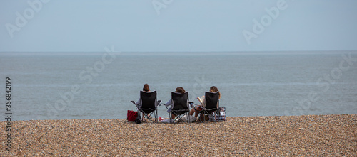 Reading quietly by the sea photo