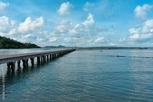 At the seashore there is a bridge. For tourists to walk and admire the view