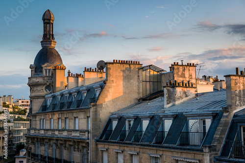 Morning view of the Parisian apartment rooftops with soft lighting