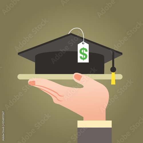 hand holding graduation hat