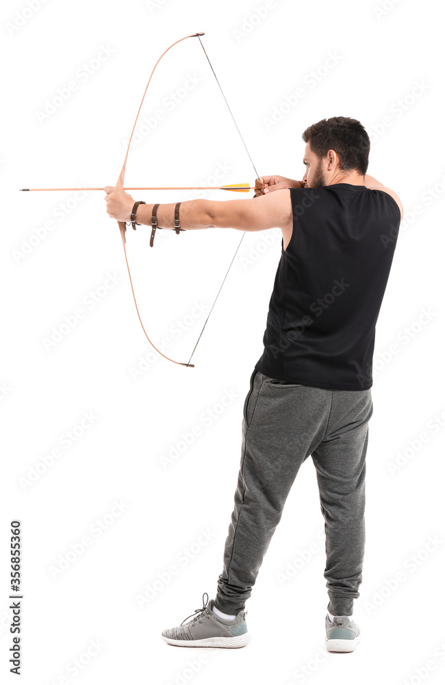 Handsome man with crossbow on white background
