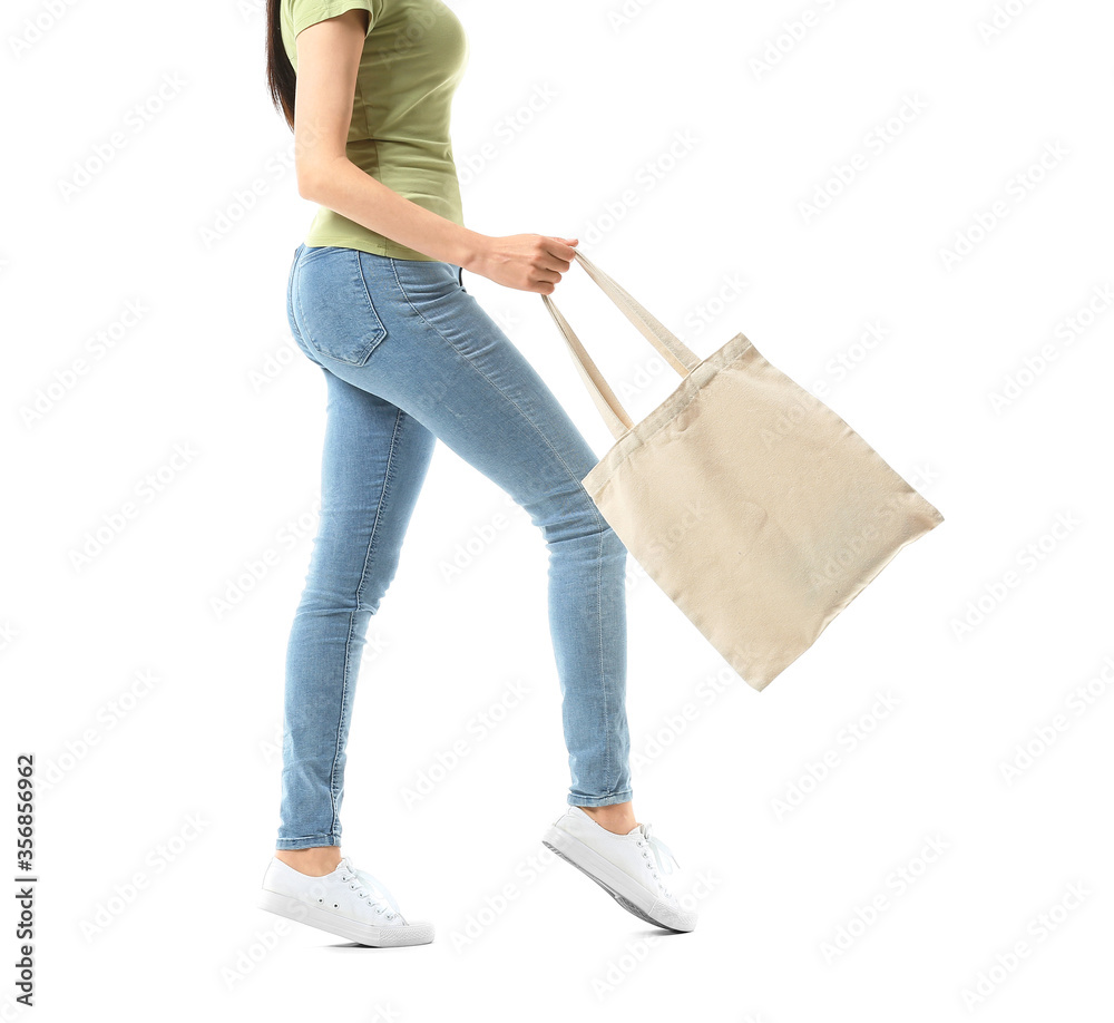 Young woman with eco bag on white background Young woman with eco bag on white background