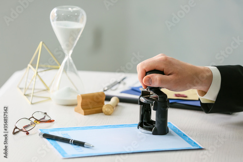 Notary public with stamp wo...