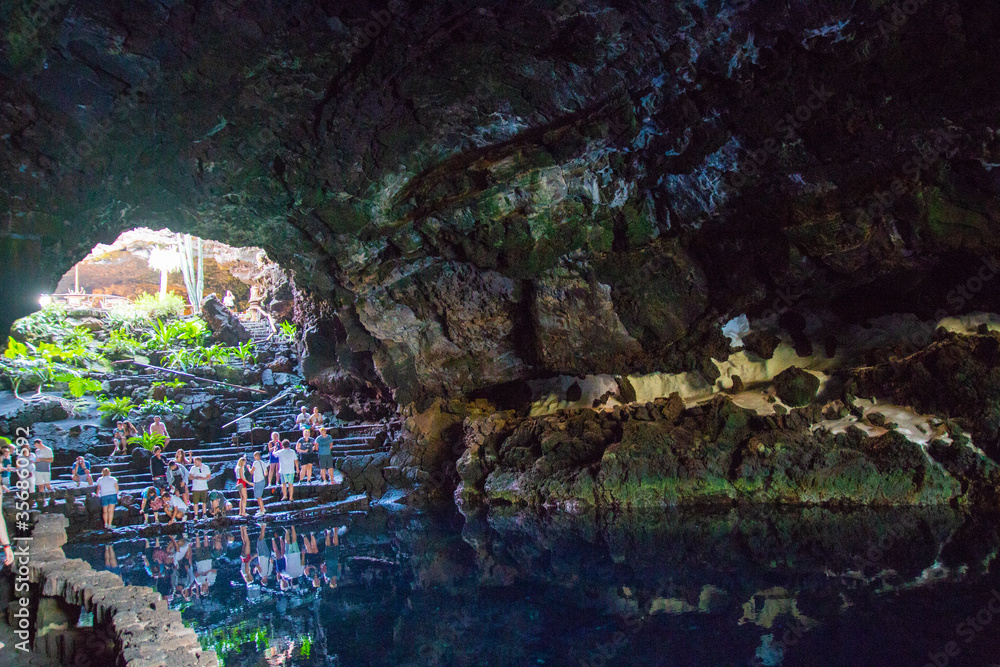 Cueva de los Verdes, Green Cave in Lanzarote. Canary Islands. an amazing lava tube and tourist attraction on Lanzarote island, Spain. Multi-colored illumination of caves. Beautiful cave. Cueva de los Verdes, Green Cave in Lanzarote. Canary Islands. an amazing lava tube and tourist attraction on Lanzarote island, Spain. Multi-colored illumination of caves. Beautiful cave.