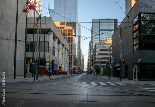 Toronto  Ontario Canada - 05 26 2020 - Empty street without people. Quarantine city Toronto buildings  skyscraper  downtown. Evening time  sunset 