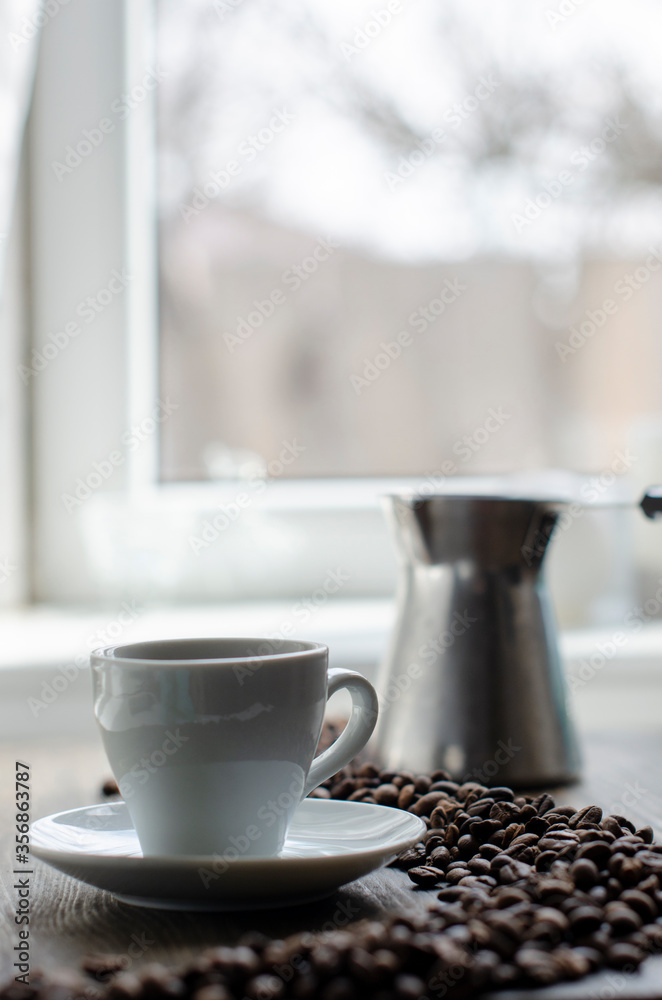 cup of coffee on the background of the window cup of coffee on the background of the window