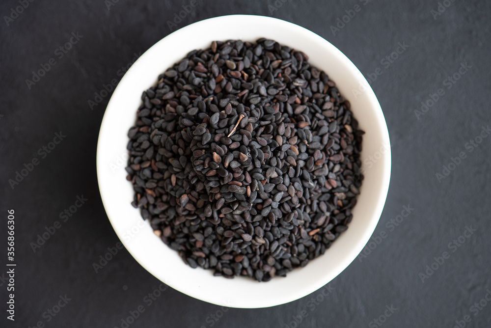 spices for cooking - black sesame seeds close-up spices for cooking - black sesame seeds close-up