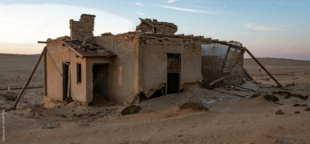 Abandoned buildings are left to rot in Kolmanskoppe, Namibia Abandoned buildings are left to rot in Kolmanskoppe, Namibia