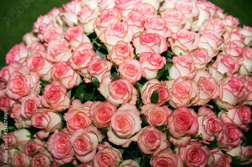 A large bouquet of pink roses.