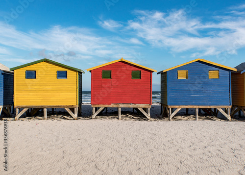 colorful beach huts of Cape Town, South Africa © Max Blumenthal