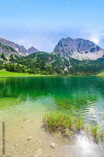 Beautiful landscape scenery of the Gaisalpsee and Rubihorn Mountain at Oberstdorf, Reflection in Mountain Lake, Allgau Alps, Bavaria, Germany photo