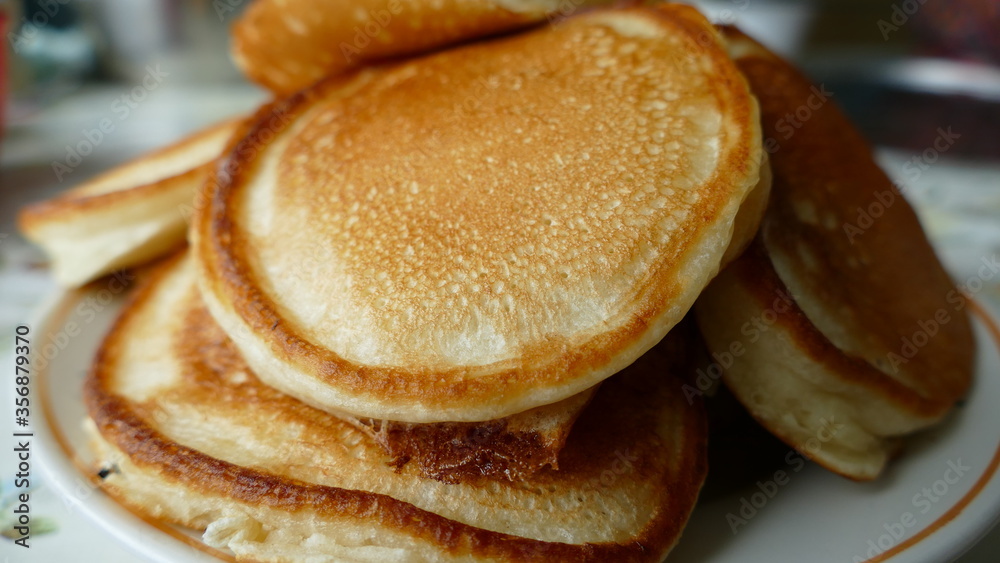 small pancakes on a plate for Breakfast small pancakes on a plate for Breakfast