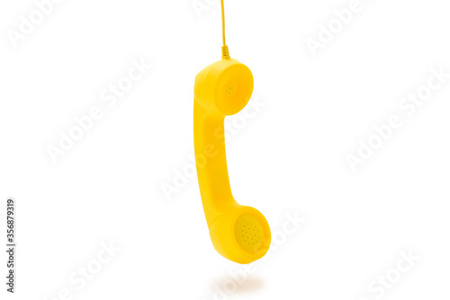 Yellow handset isolated on white.