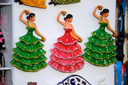 Three souvenir flamenco dancer fridge magnets, Malaga, Spain.