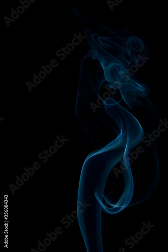 Abstract blue smoke on black background. Concept of Aromatherapy . Soft focus
