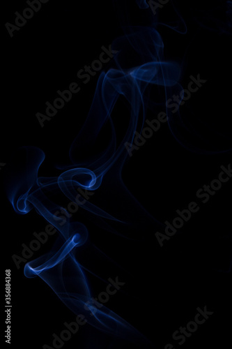  blue smoke on black background.
