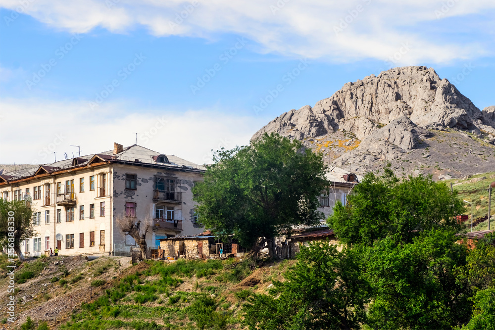 House of stones. Old house in the mountains. Abandoned house in the mountains. Mountain village. Abandoned city. Mountain landscape. Mountains near the house.