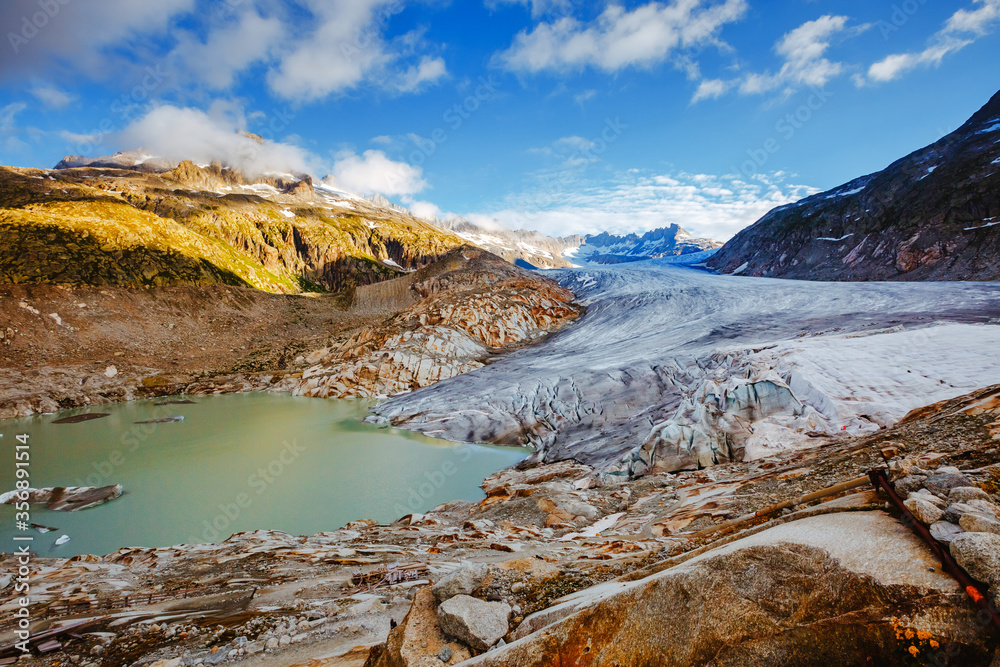 Naklejka premium Great sunny day in the Alpine valley. Location place of Bernese Alps, Rhone glacier, Swiss alps.