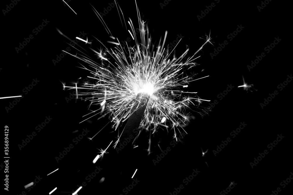 custom made wallpaper toronto digitalWhite sparkler countdown on fire with spread of glitter sparks. Luxury entertainment at e.g. New Years Eve, Independence Day or birthday party celebration. Glowing light spark on dark background