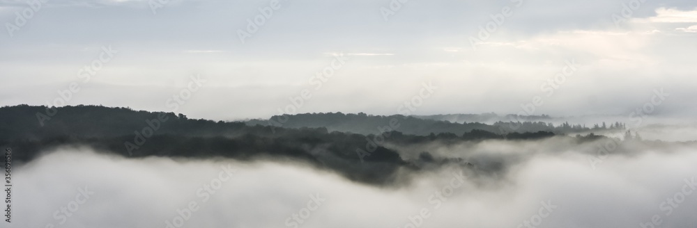 I also took this panorama photo early in the morning from the terrace of our house. Is such a beautiful view if you sit above the clouds and just see the tops of the hills and trees.