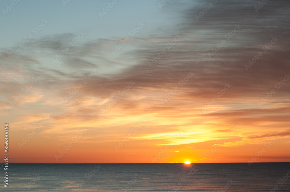 Naklejka premium Sunrise in the desert near Douz in Kebili, Tunisia