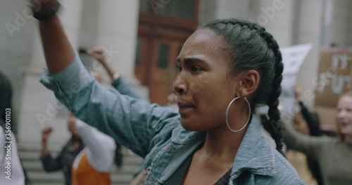 Angry activists marching and protesting in the city